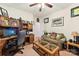 Home office features built-in shelving, desk, and comfortable seating at 416 Zelkova St, York, SC 29745