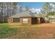 Brick house with screened porch and fenced backyard at 416 Zelkova St, York, SC 29745