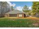 Brick house with screened porch and fenced backyard at 416 Zelkova St, York, SC 29745