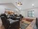 Comfortable living room featuring a high ceiling, hardwood floors, and lots of natural light at 416 Zelkova St, York, SC 29745
