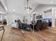 Bright living room featuring a high ceiling, hardwood floors, and a cozy seating area with a fireplace at 416 Zelkova St, York, SC 29745