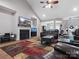 Spacious living room with a fireplace, high ceilings, and an open layout, perfect for entertaining and Gathering gatherings at 416 Zelkova St, York, SC 29745