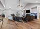 Bright living room featuring a high ceiling, hardwood floors, and a cozy seating area with a fireplace at 416 Zelkova St, York, SC 29745
