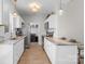 Updated kitchen featuring granite countertops and white cabinetry at 435 Mint St, Rock Hill, SC 29730