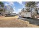 Spacious backyard with view of neighboring houses at 504 E Poplar St, Dallas, NC 28034