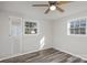 Spacious bedroom with wood flooring and large windows at 504 E Poplar St, Dallas, NC 28034