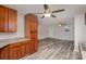 Bright kitchen with granite countertops and wood cabinets at 504 E Poplar St, Dallas, NC 28034