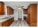 Renovated kitchen, featuring wood cabinets and granite counters at 504 E Poplar St, Dallas, NC 28034