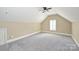 Large bedroom with vaulted ceiling, window, and ceiling fan at 6726 Thornton Oaks Ct, Charlotte, NC 28270