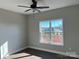 Bright bedroom with hardwood floors and window view at 7311 Mooresville Rd, Salisbury, NC 28147