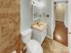 Clean bathroom with tile flooring and updated vanity at 8003 Regent Park Ln, Charlotte, NC 28210