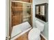 Clean bathroom with shower and updated vanity at 8003 Regent Park Ln, Charlotte, NC 28210