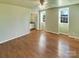 Main bedroom with light walls, hardwood floors and en-suite bathroom at 8003 Regent Park Ln, Charlotte, NC 28210