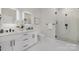 Elegant bathroom with double vanity, frameless glass shower and modern fixtures at 8260 Blades Trl, Denver, NC 28037