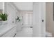 Clean bathroom with modern vanity and a large window at 8260 Blades Trl, Denver, NC 28037