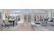 Bright dining area with large windows and access to deck at 8260 Blades Trl, Denver, NC 28037
