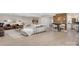 Open-concept living area with hardwood floors and a modern aesthetic at 8260 Blades Trl, Denver, NC 28037