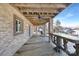 Covered patio with concrete floor and lake view at 8260 Blades Trl, Denver, NC 28037