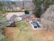 Aerial view of house, showing backyard with inground pool and gazebo at 9330 Bellhaven Blvd, Charlotte, NC 28214