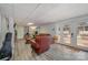 Spacious basement recreation area with access to backyard patio at 9330 Bellhaven Blvd, Charlotte, NC 28214