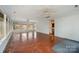 Spacious sunroom with terracotta tile floors and views to backyard at 9330 Bellhaven Blvd, Charlotte, NC 28214