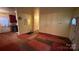 Open living room with access to kitchen and hallway at 1105 Norris Ave, Charlotte, NC 28206