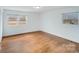 Spacious bedroom featuring hardwood floors and natural light at 111 Oakmont Rd, Stanley, NC 28164