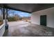 Covered carport with storage area and view of backyard at 111 Oakmont Rd, Stanley, NC 28164