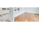 Open dining area with hardwood floors and kitchen view at 111 Oakmont Rd, Stanley, NC 28164