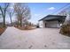 Long concrete driveway with ample parking space at 111 Oakmont Rd, Stanley, NC 28164
