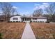 Attractive ranch house with landscaping and walkway at 111 Oakmont Rd, Stanley, NC 28164