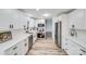 Modern kitchen with white cabinets, quartz countertops, and stainless steel appliances at 111 Oakmont Rd, Stanley, NC 28164