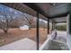 Side yard view from covered porch, showing shed and trees at 111 Oakmont Rd, Stanley, NC 28164