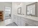 Double vanity, marble countertops, and large mirrors at 114 38Th Nw Ave, Hickory, NC 28601