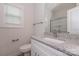 Bathroom boasts granite countertop and modern vanity at 13331 Central Ave, Huntersville, NC 28078