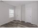 Spacious bedroom with hardwood floors and neutral walls at 13331 Central Ave, Huntersville, NC 28078