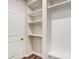 Bright entryway with built-in shelving and bench at 14926 Tamarack Dr, Charlotte, NC 28278