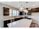 Modern kitchen with island and stainless steel appliances at 14926 Tamarack Dr, Charlotte, NC 28278