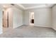 Main bedroom with carpeted floor and ensuite bathroom at 14926 Tamarack Dr, Charlotte, NC 28278