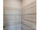 Built-in pantry with wire shelving at 14926 Tamarack Dr, Charlotte, NC 28278