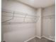 Walk-in closet with wire shelving at 14926 Tamarack Dr, Charlotte, NC 28278