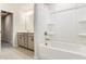 Clean bathroom, featuring a vanity, bathtub and shower at 14930 Tamarack Dr, Charlotte, NC 28278