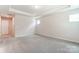 Spacious bedroom with carpet and lots of natural light at 14930 Tamarack Dr, Charlotte, NC 28278