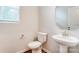 Convenient powder room with pedestal sink and updated fixtures at 14930 Tamarack Dr, Charlotte, NC 28278