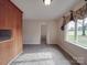 Bright dining area with tile flooring and a view to the backyard at 1515 Hasty Rd, Marshville, NC 28103