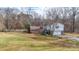 Brick ranch house with attached garage and large backyard at 4621 Wolf Pond Rd, Monroe, NC 28112