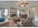 Living room with stone fireplace and comfortable seating at 4621 Wolf Pond Rd, Monroe, NC 28112