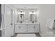 Modern bathroom with double vanity and updated fixtures at 520 W 5Th Ave, Gastonia, NC 28052