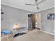Bedroom with carpet, ceiling fan, closet and gray walls at 549 Dairy Rd, Troy, NC 27371