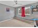 Bedroom with neutral walls, carpeted floors, ceiling fan and natural light at 549 Dairy Rd, Troy, NC 27371